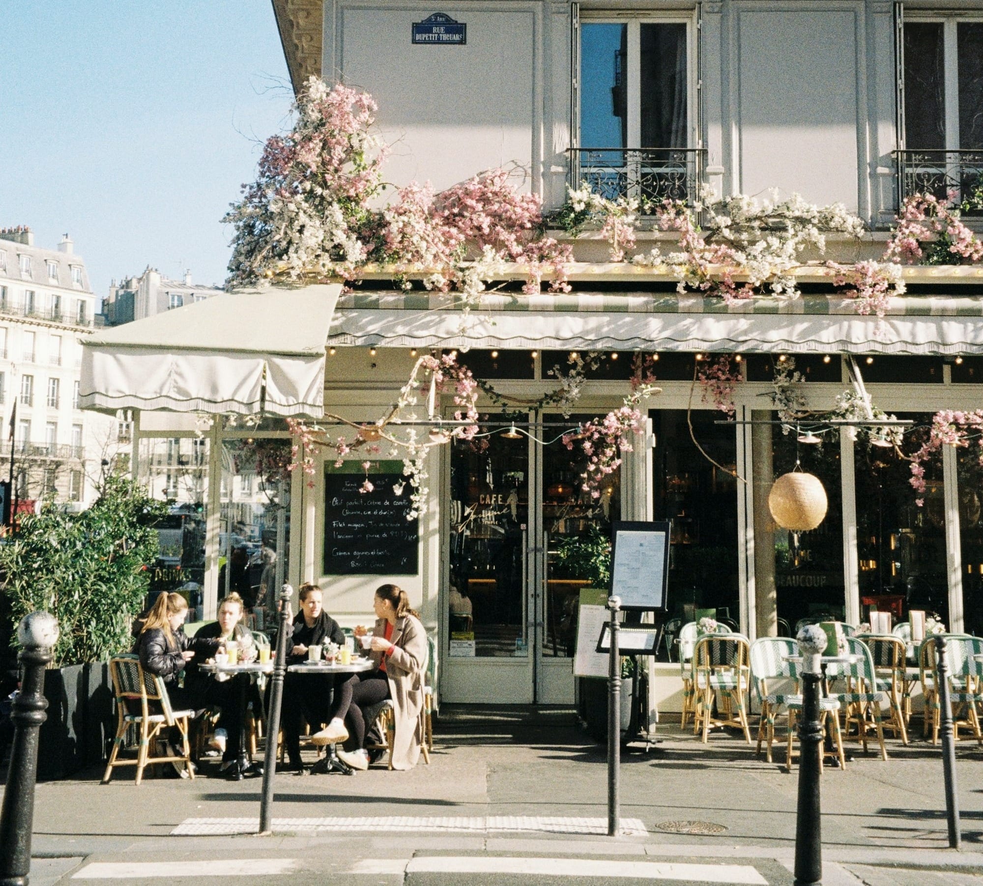 A building that has a bunch of flowers on it